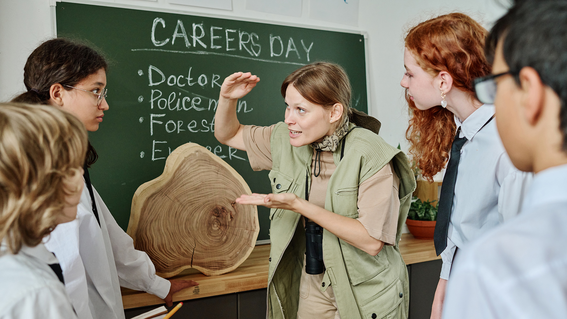 Female forester speaking about tree rings
